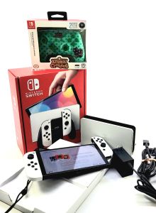 Combo Nintendo Switch OLED Blanche et manette Animal Crossing neuve sans fils(neuve)