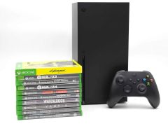 Console Xbox Séries X avec une manette et 3 Jeux