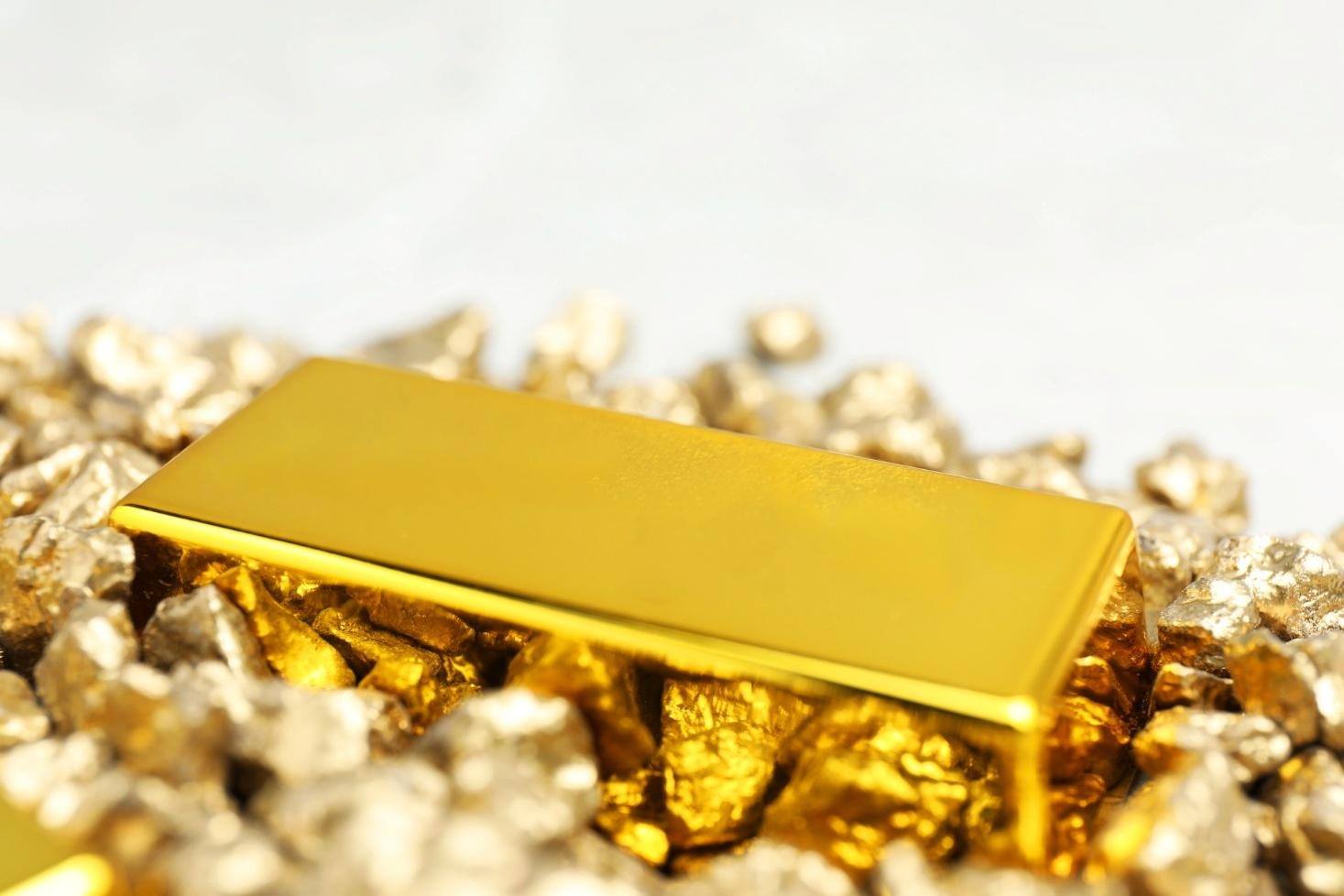 A gold bar and gold rocks